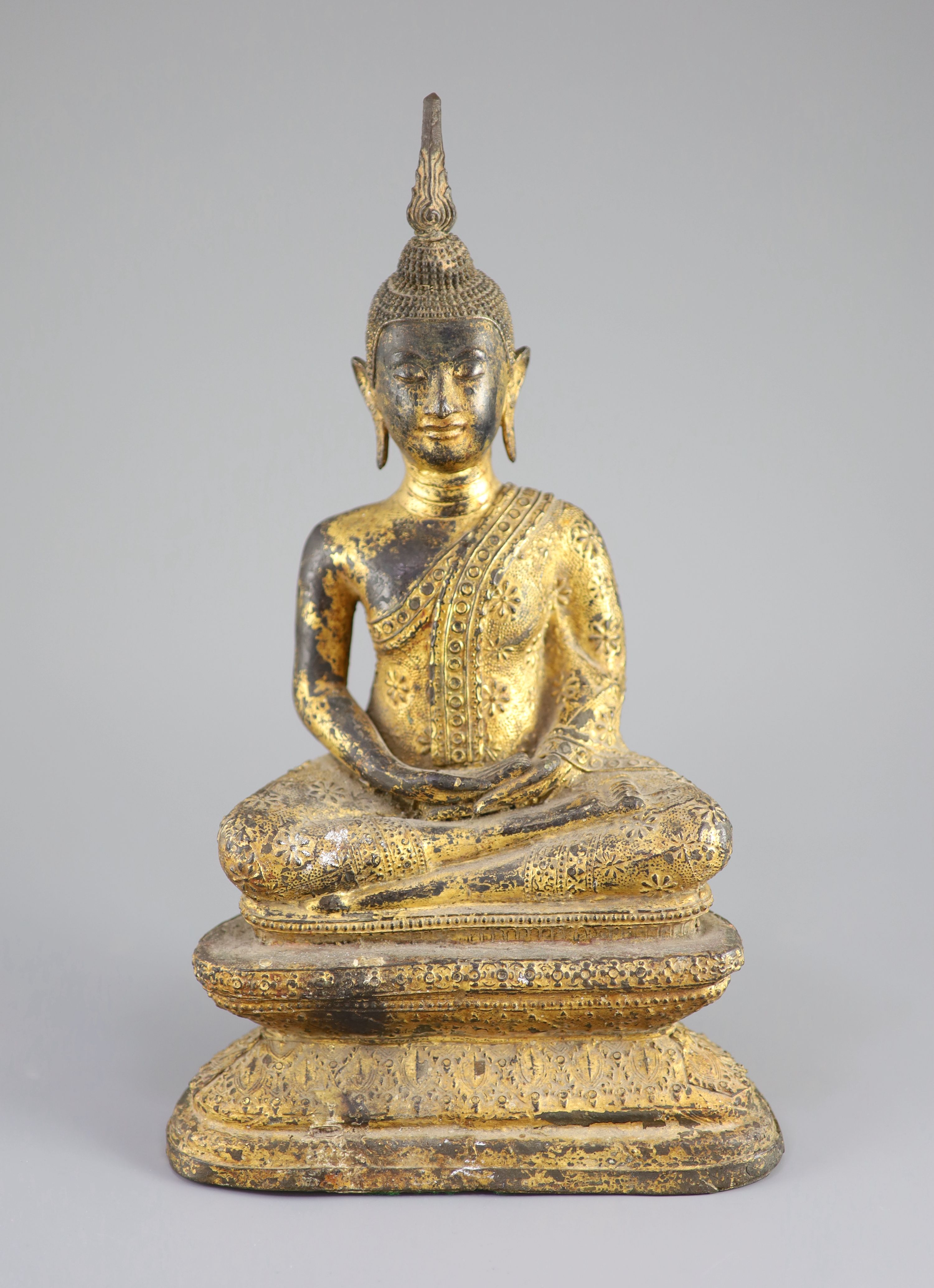 A Thai gilt bronze seated figure of Buddha, 18th/19th century, 33 cm high